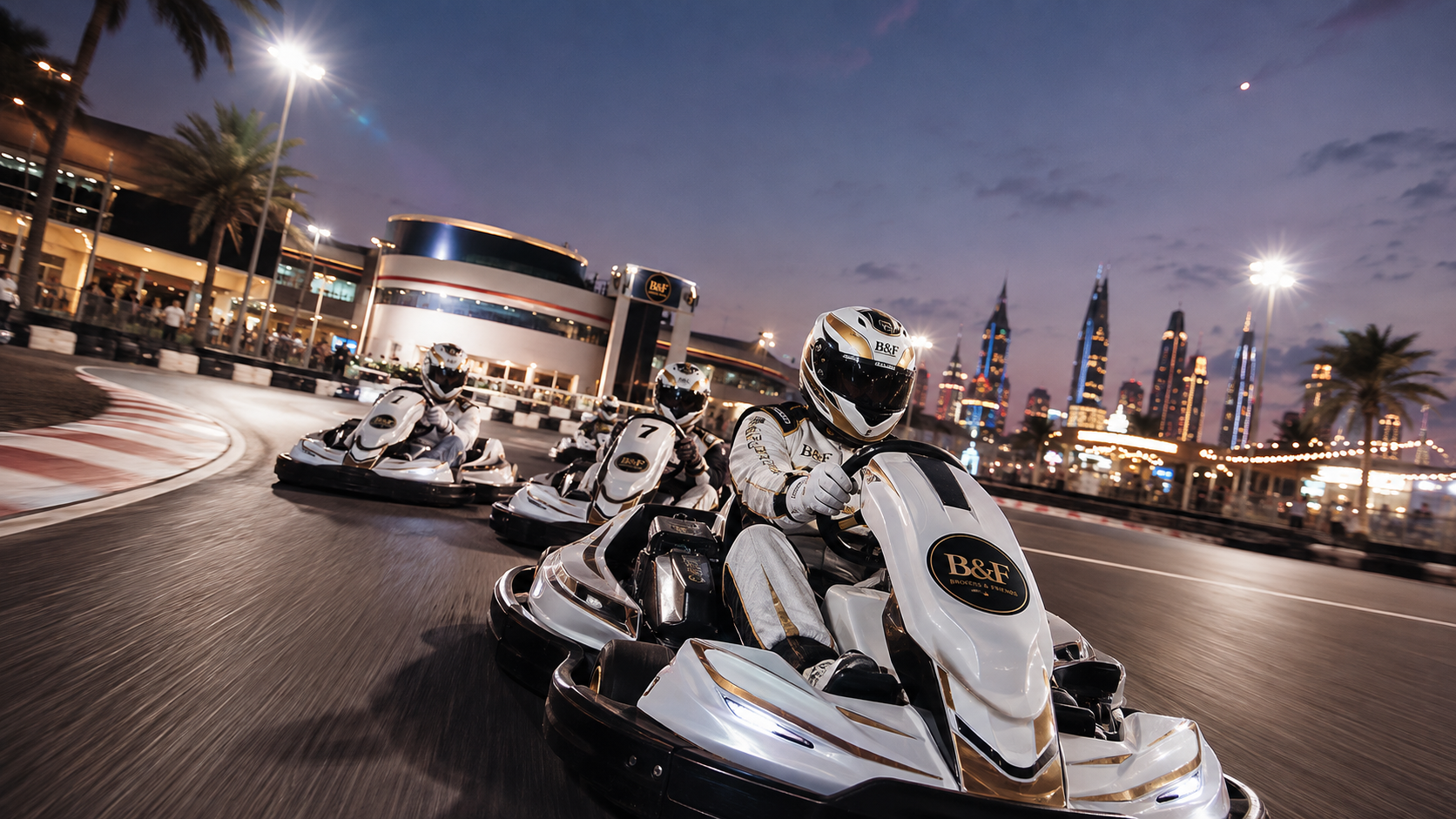 Brokers & Friends karts racing three-wide under the track lights